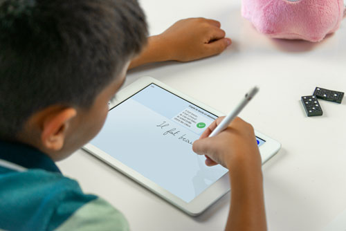 child using the Dynamilis Handwriting improvement app